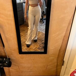 Cream flared pants from Princess Polly